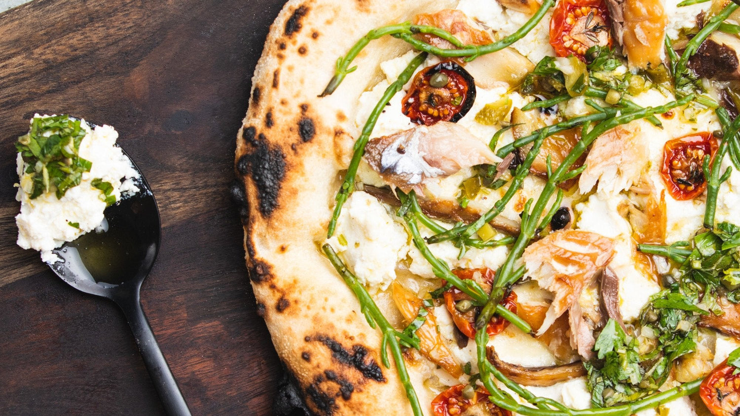 Smoked Mackerel, Sun-blushed Tomato, Samphire & Salsa Verdi Pizza - Gozney . Roccbox recipe poster image