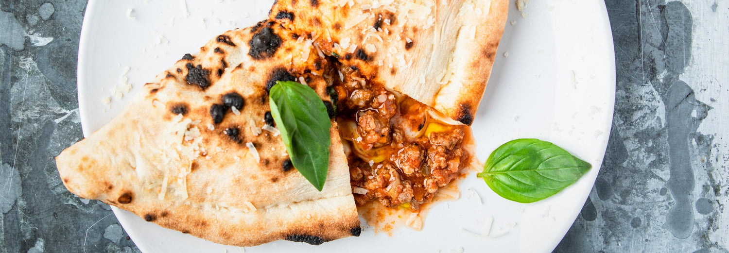 Ragu Calzone Recipe - Gozney . Roccbox recipe poster image