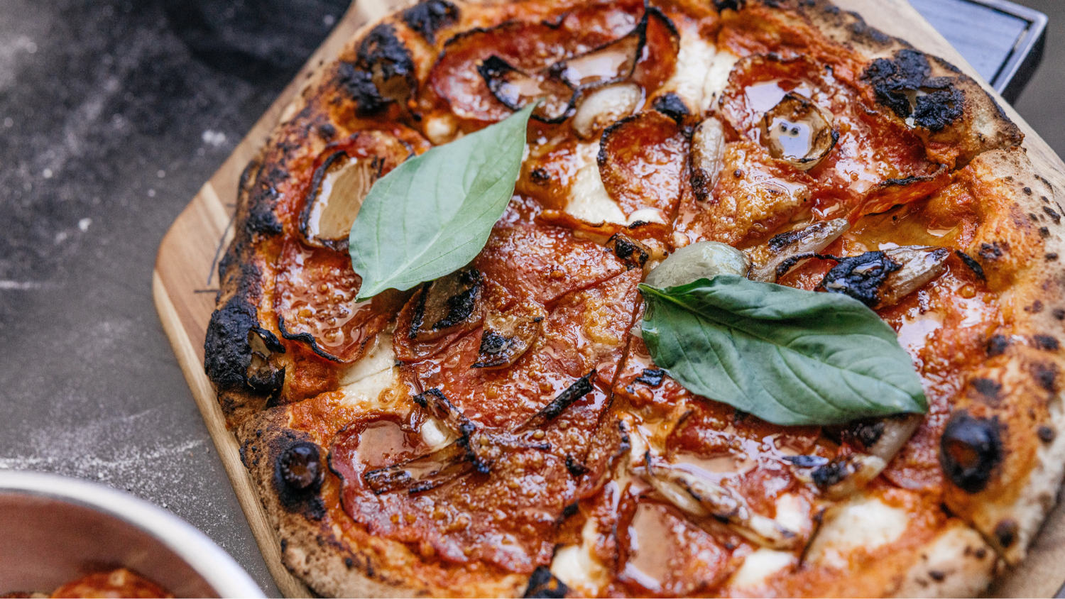 spicy italian pizza with basil and shallots