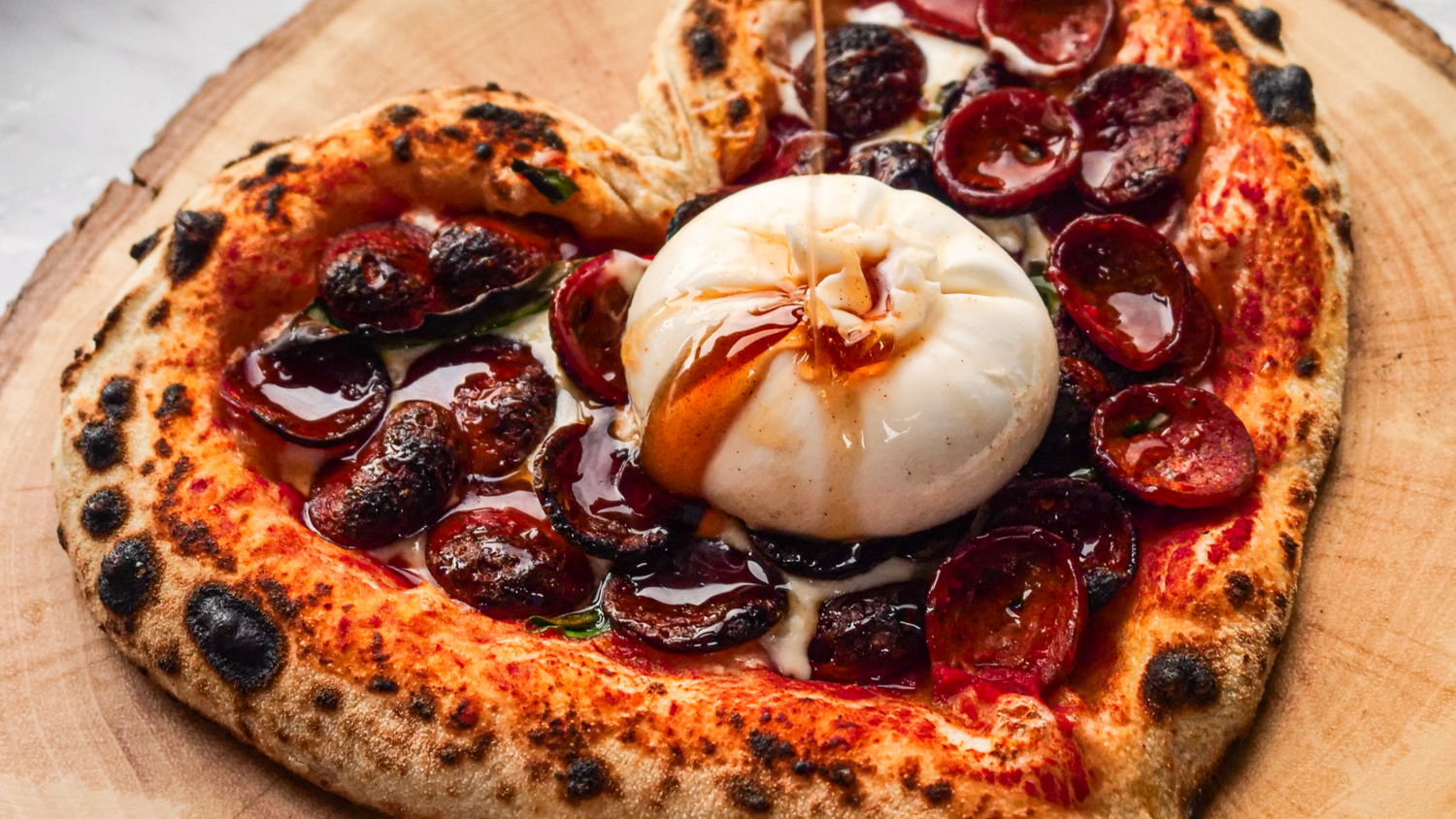 Valentines day pizza shaped as a heart recipe poster image